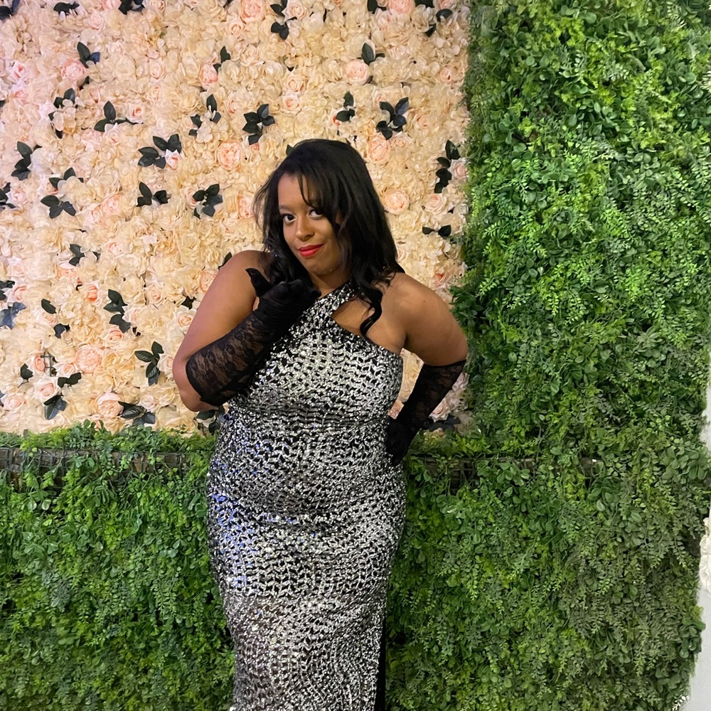 Halter formal dress with sequins and padded bra.
